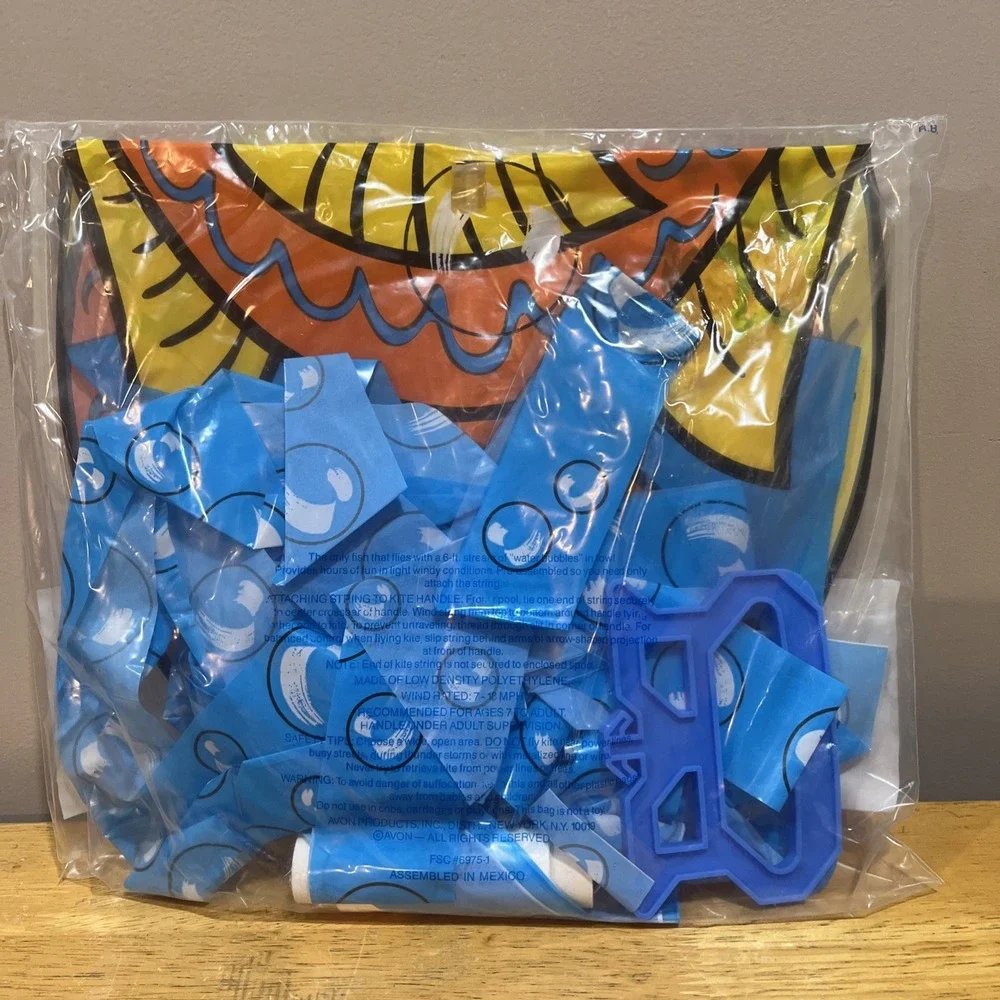 VTG 1991‎ Avon Flyin Fish Kit Orange fish with blue and yellow accent NOS